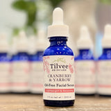 Cranberry and Yarrow Oil-Free Facial Serum in a 1 ounce blue glass bottle with a dropper. This serum is oil regulating and suitable for oily, combination, acne, problematic skin types.