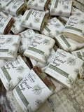 Tilvee Forest Soap bars with packaging on a rustic wooden surface