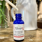 Cranberry and Yarrow Oil-Free Facial Serum in a 1 ounce blue glass bottle with a dropper. This serum is oil regulating and suitable for oily, combination, acne, problematic skin types.